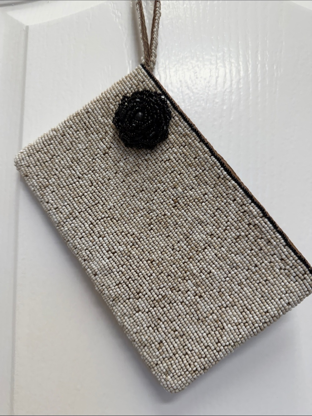 Beaded Cream Wristlet Clutch with Black Floral Accent